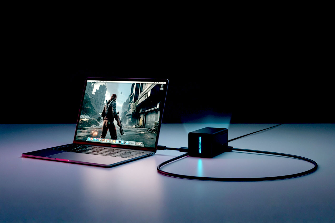 A sleek, modern ultrabook laptop sits on a clean, minimalist desk. A single, braided Thunderbolt cable connects it to a stylish, matte black eGPU enclosure placed neatly beside it. The laptop screen vividly displays a high-action scene from a cutting-edge video game, showcasing impressive graphics. Subtle, cool-toned LED lighting emanates from the eGPU enclosure, hinting at the power within. The overall aesthetic is professional, high-tech, and aspirational, with a focus on the seamless connection transforming the everyday laptop into a gaming beast. Lighting is slightly dramatic, highlighting the textures and forms of the devices.